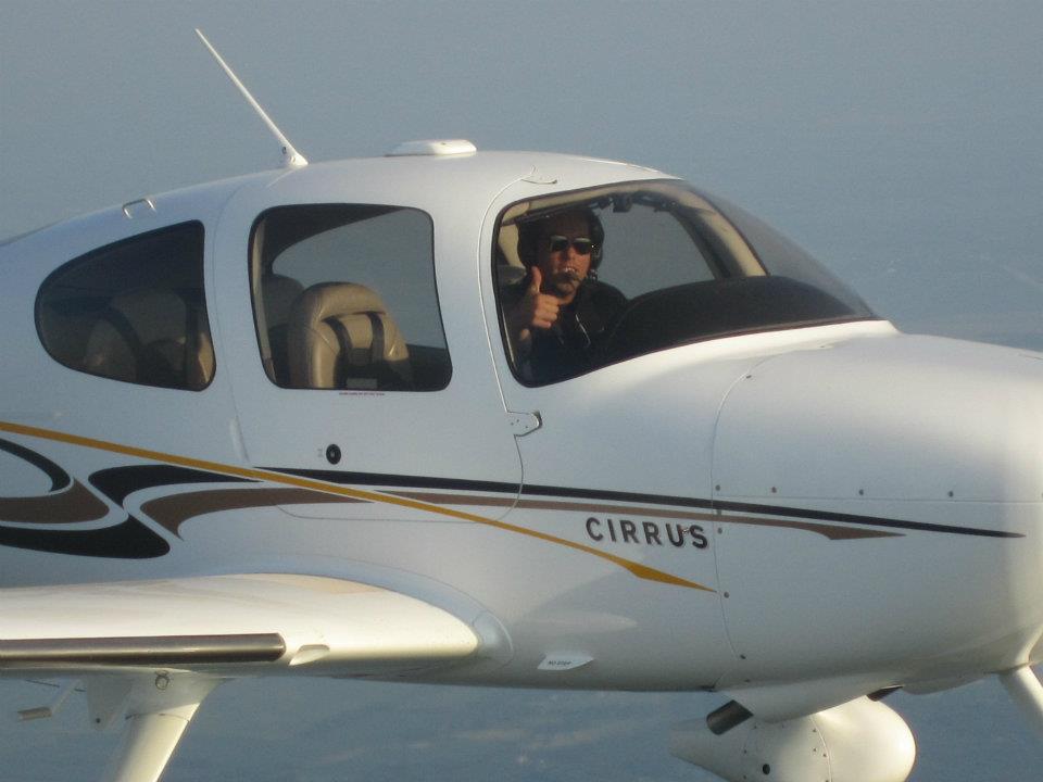 Cirrus aircraft in flight