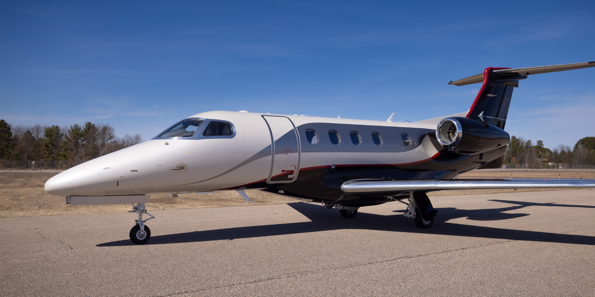 side view of plane sitting on runway