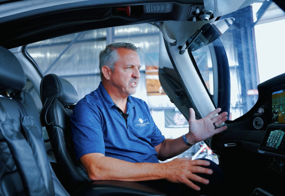Lone Mountain rep showing interior of plane