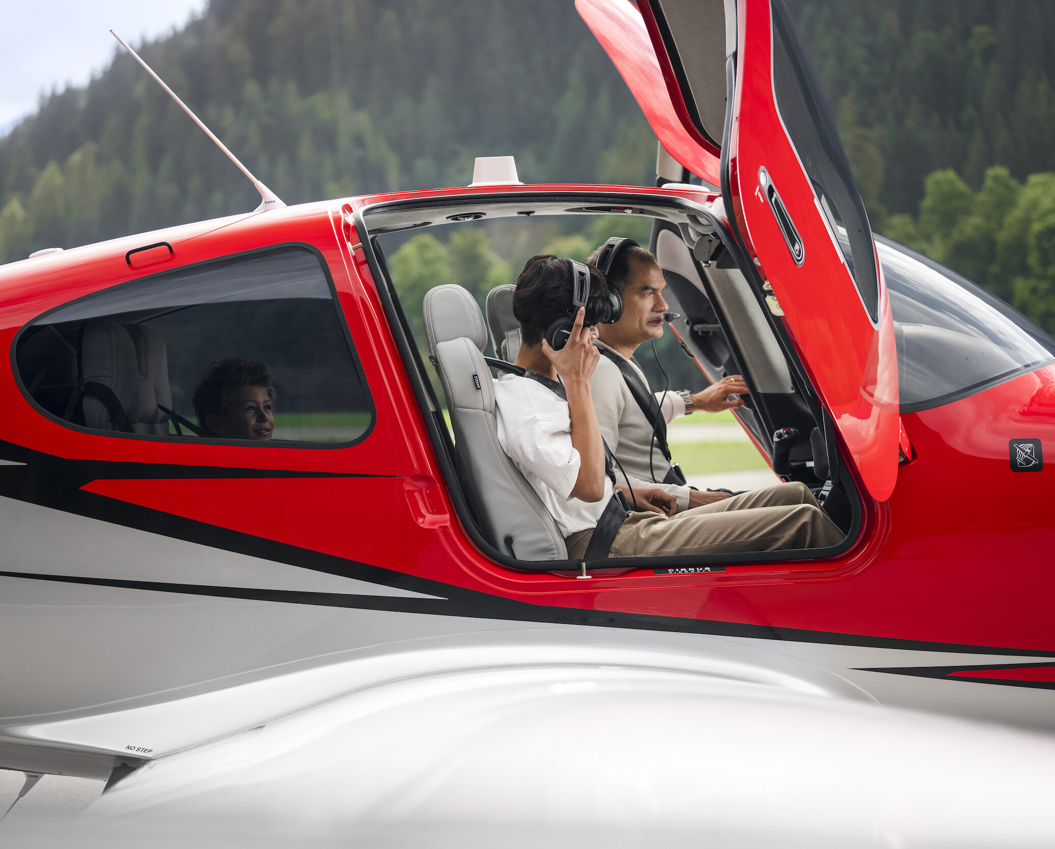 Family in Cirrus plane