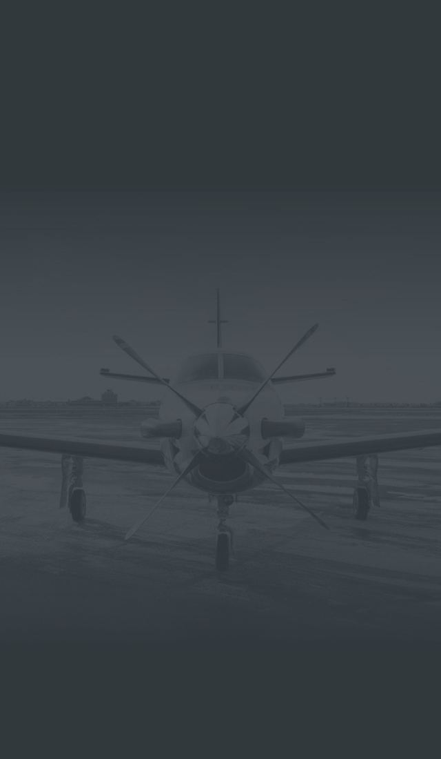 front view of TBM plane on tarmac