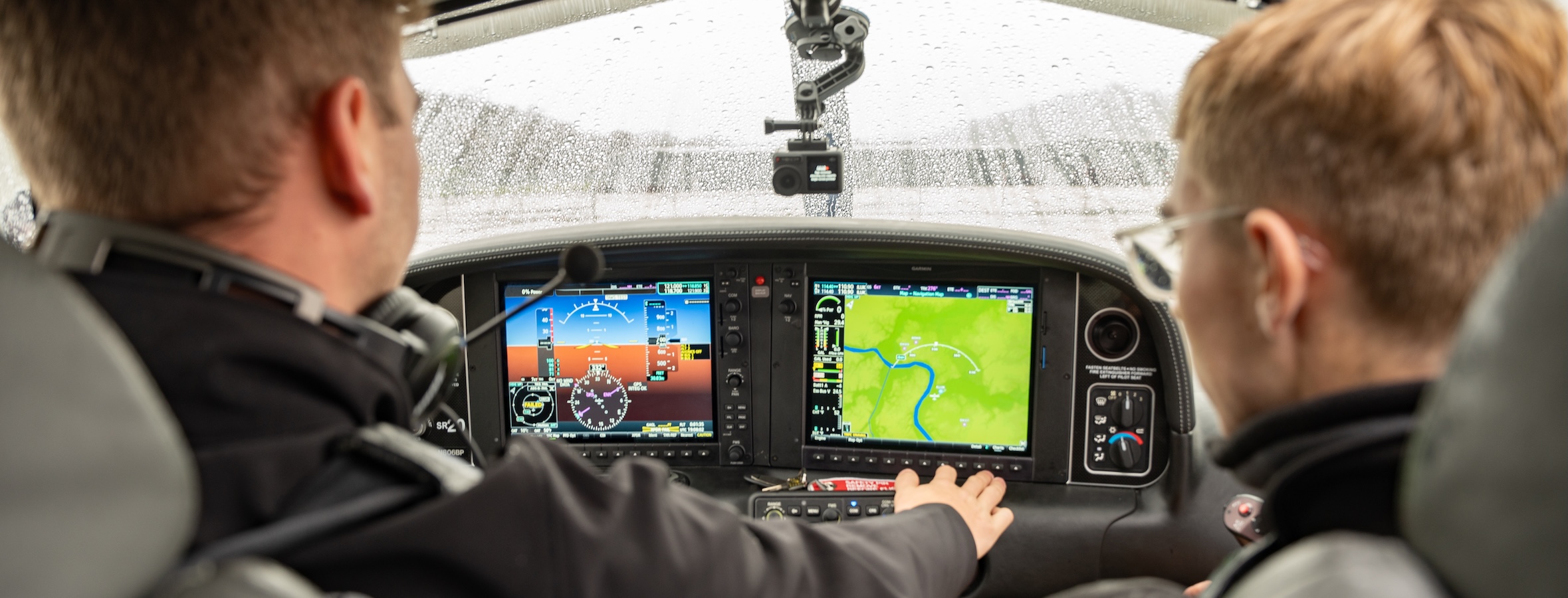 two pilots in a cockpit